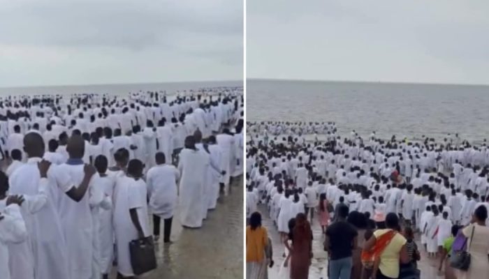 Uma multidão de pessoas foi batizada em uma praia na capital de Moçambique. (Foto: Reprodução...